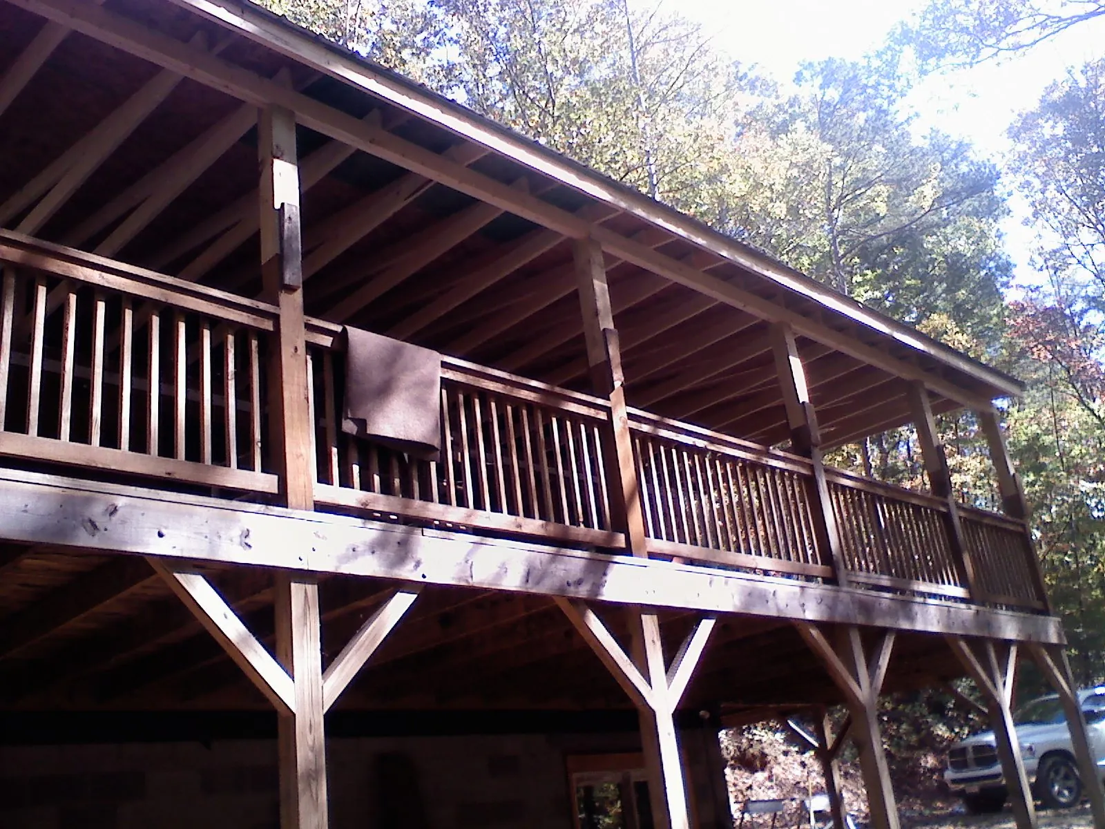 Timber framing under a new elevated porch and deck — Roof Leak Repair in Ellis by Roofing Brothers